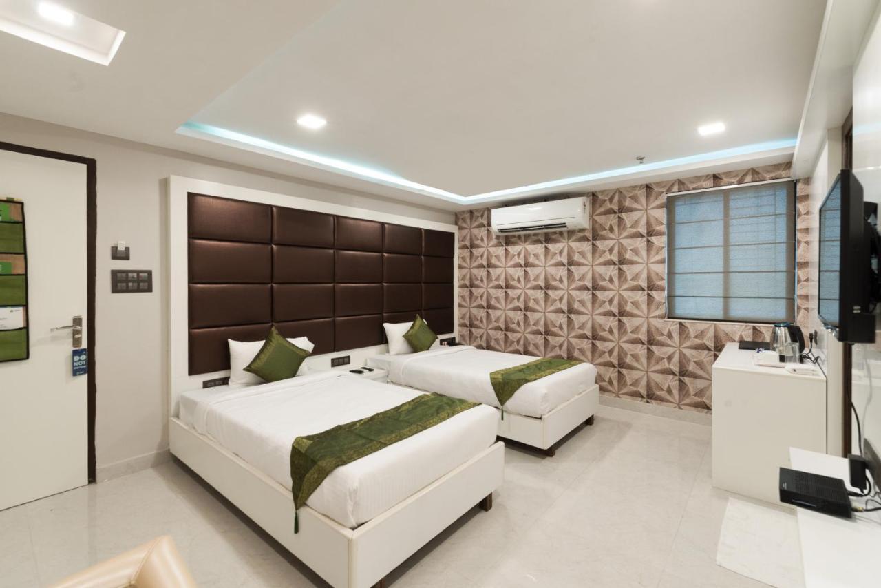 Treebo Trend Glorious Rim Rocks Palace Calcutá Exterior foto